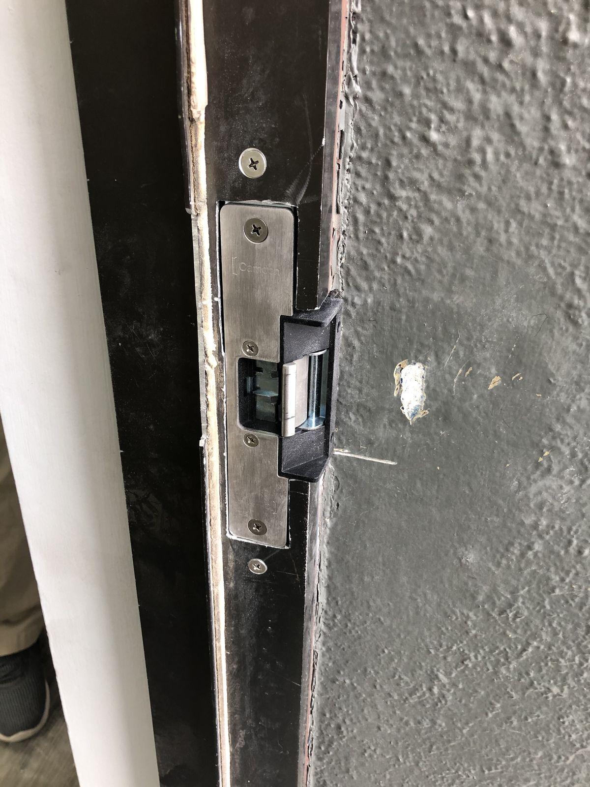 Electric strike installed as part of a commercial access control system